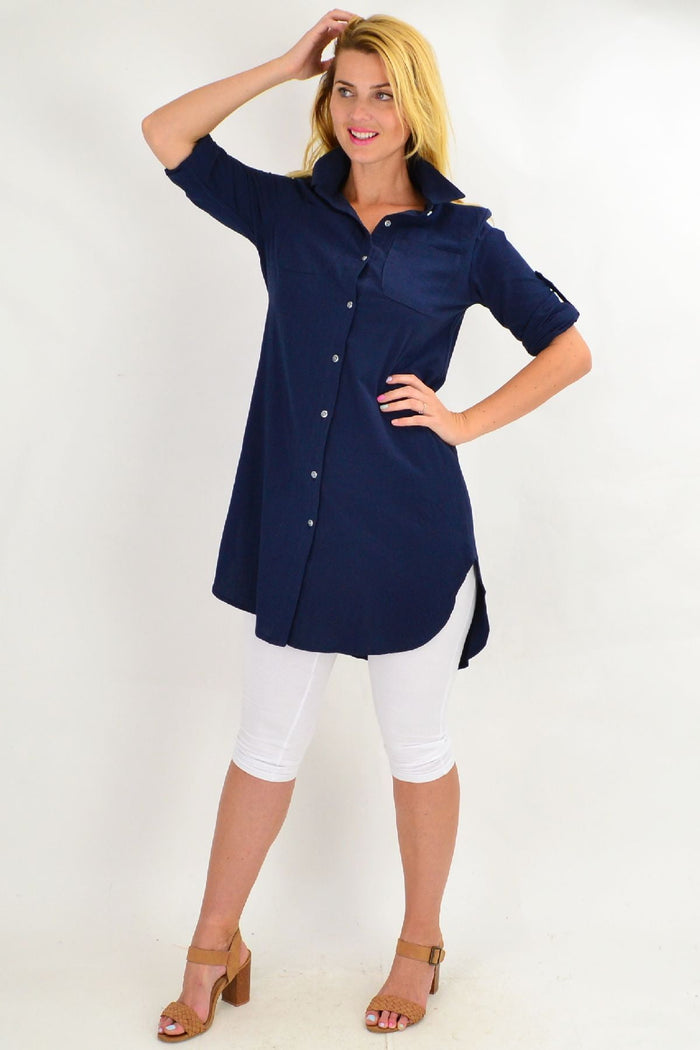 Navy blue summer tunic shirt by Ruby Rain featuring lightweight fabric and relaxed fit, displayed on a hanger.