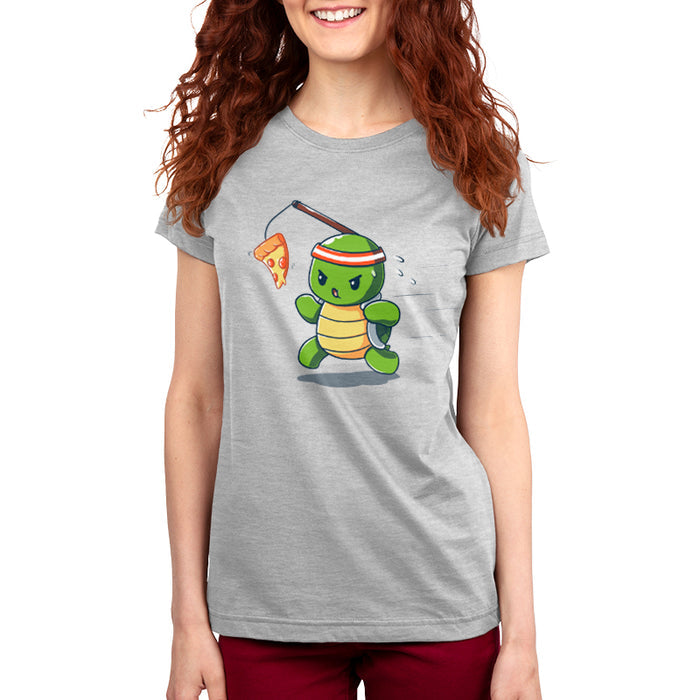 Premium Cotton T-shirt_TeeTurtle silver grey Ninja Training t-shirt featuring a turtle chasing after a pizza slice dangling from a stick strapped to their head.