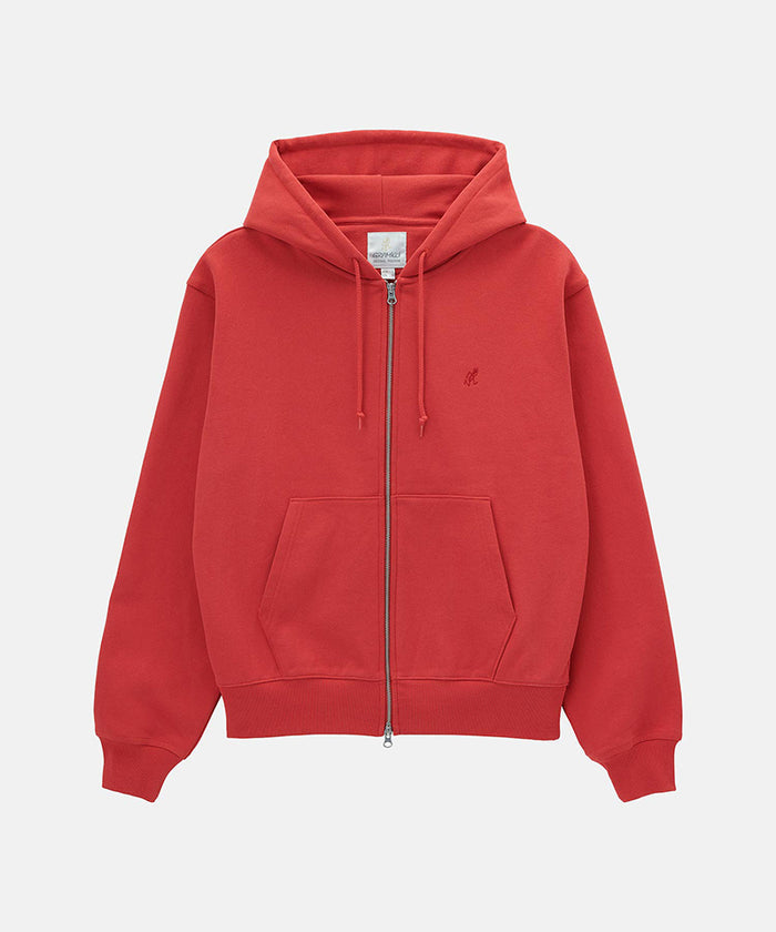 Gramicci crimson red One Point Zip Hooded Sweatshirt against a light-tone background.