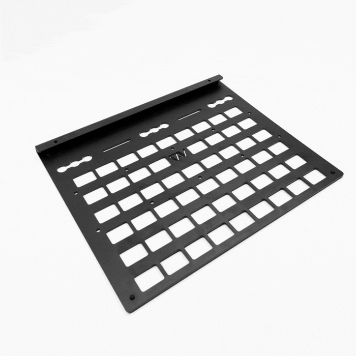 Owl Vans rear storage box molly panel with square cutouts lying on a white background