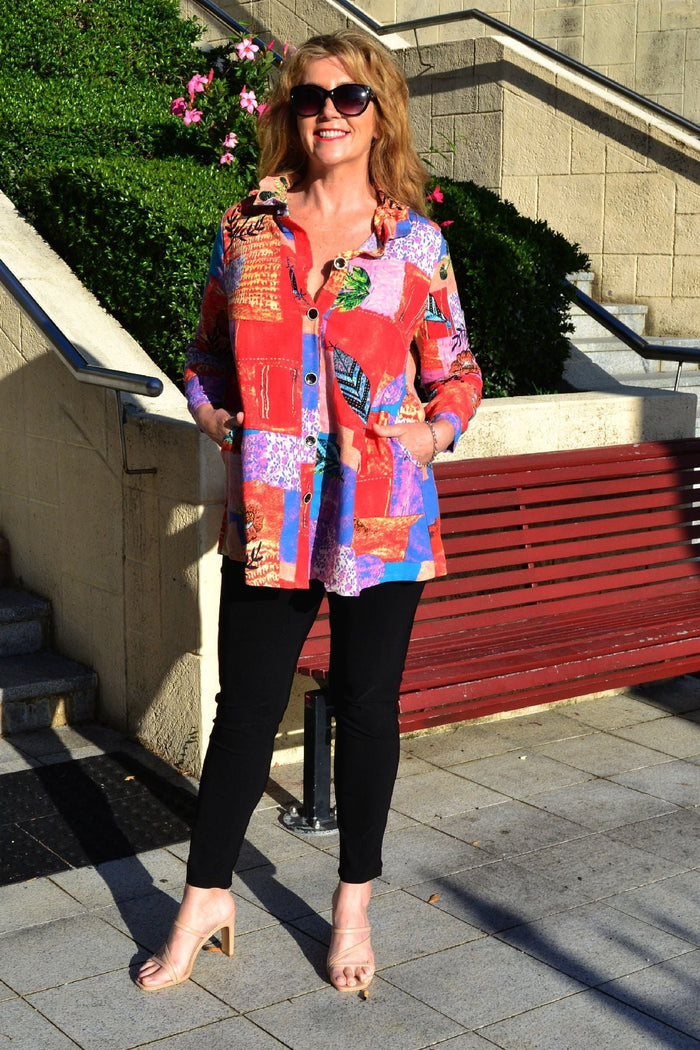 Ruby Rain quilted pocket high collar tunic shirt with long sleeves, front pocket, and quilted fabric for a stylish, cozy look.