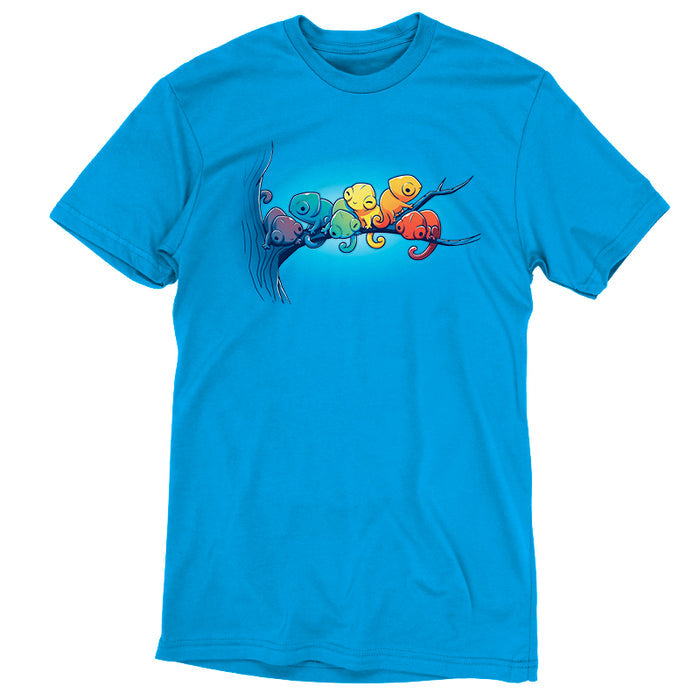 Premium Cotton T-shirt_Teeturtle cobalt blue Rainbow Chameleons apparel featuring a group of six chameleons sitting on a tree branch, each a different color, in rainbow gradient.
