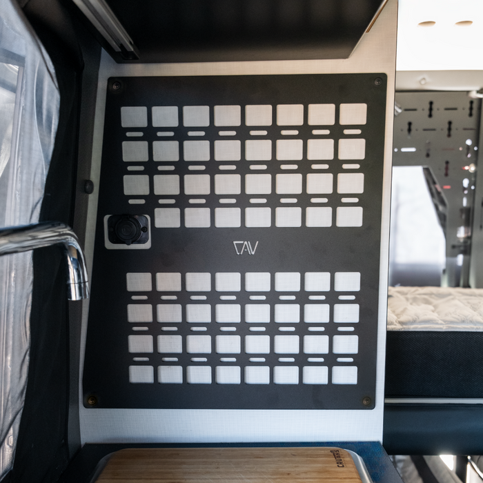CAV Revel Kitchen MOLLE Panel mounted inside a van near sink and bed area
