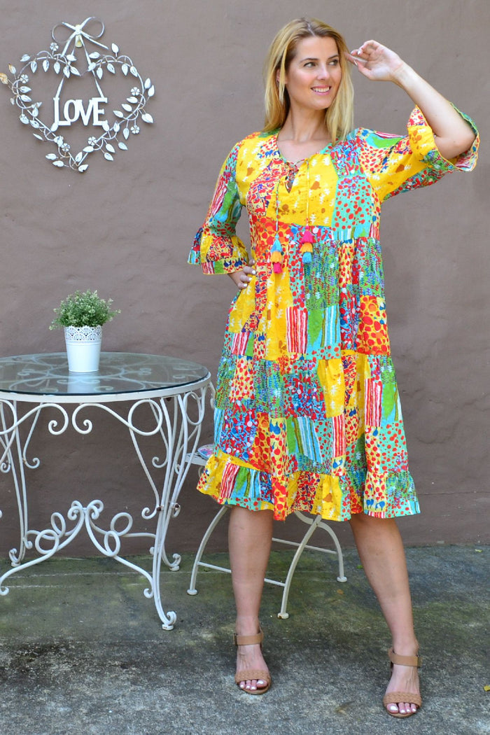 Wishstone Sandy Beach tiered tunic dress featuring lightweight fabric and relaxed fit, ideal for casual summer wear.