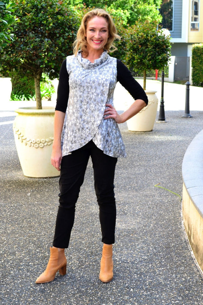 Silver flower cowl neck tunic top by Caroline Morgan, showcasing a flowy silhouette with floral patterns and a stylish cowl neckline.