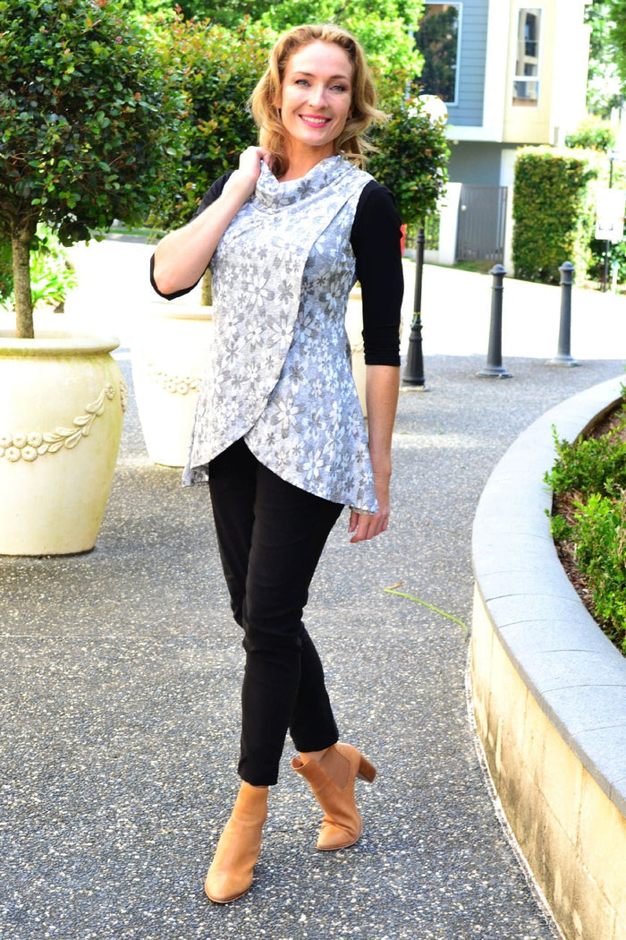 Silver flower cowl neck tunic top by Caroline Morgan, featuring a flowing design and floral pattern, displayed on a neutral background.