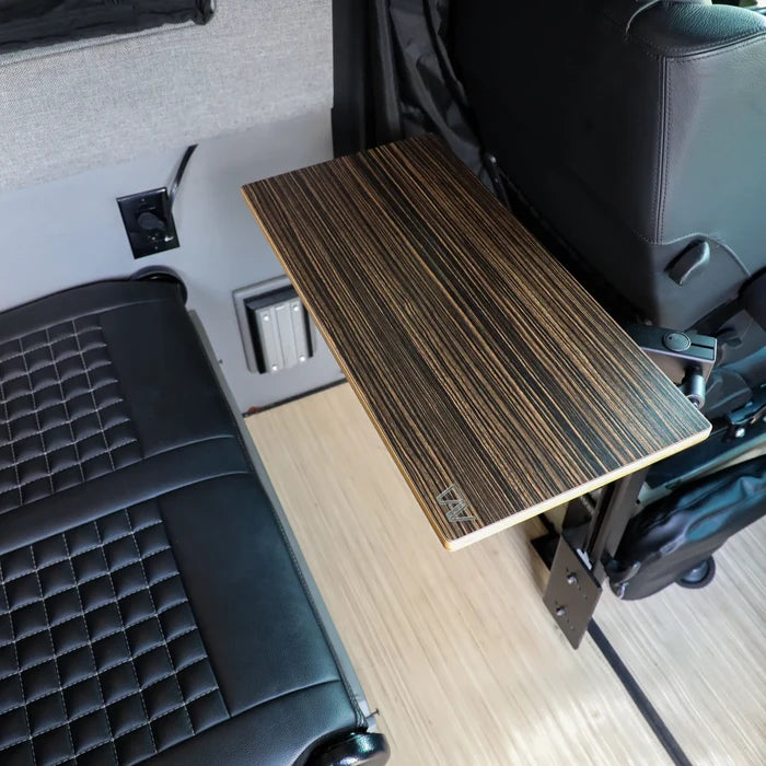 Small Universal Table Top by CAV mounted between front seat and bench in van interior.