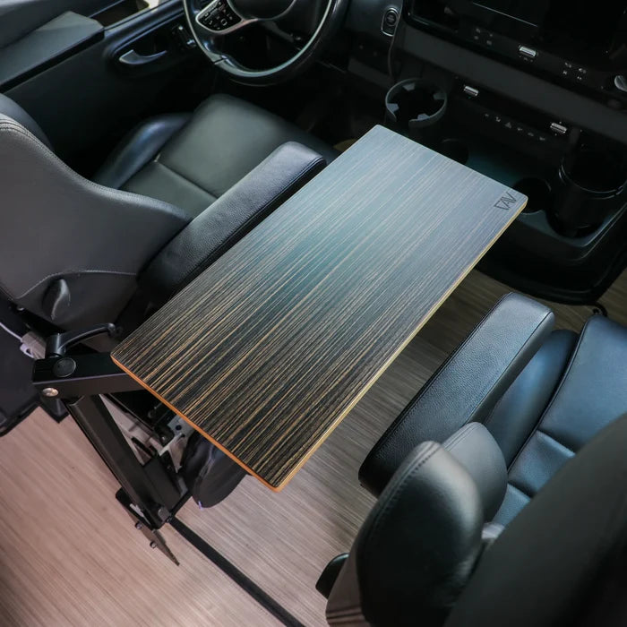 Small Universal Table Top by CAV mounted between swivel seats in a van interior