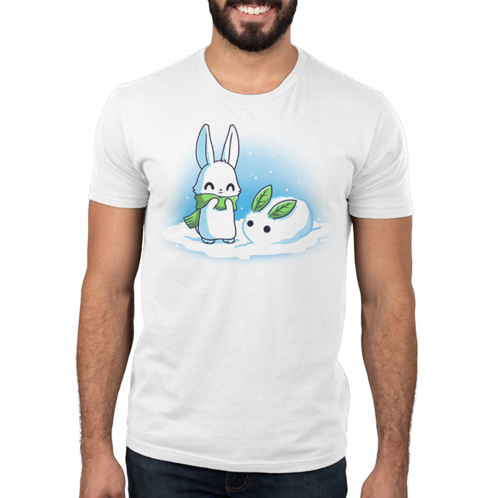 Premium Cotton T-shirt_TeeTurtle Snow Bunnies white t-shirt featuring a smiley white bunny out in the snow wearing a green scarf with a little snowbunny with green leaves as years right next to them