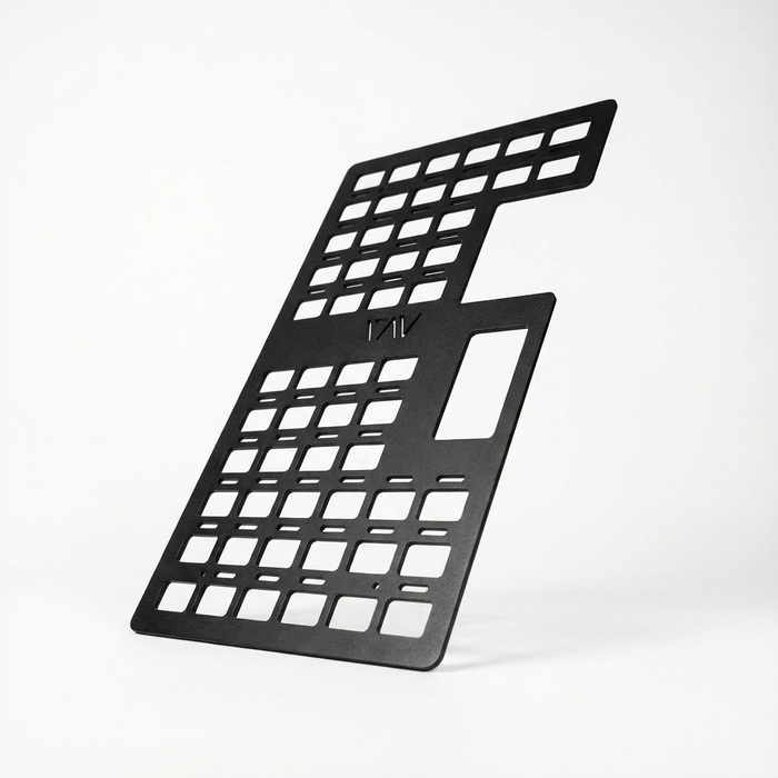 Black Storyteller Galley MOLLE Panel with grid cutouts for van storage and organization.
