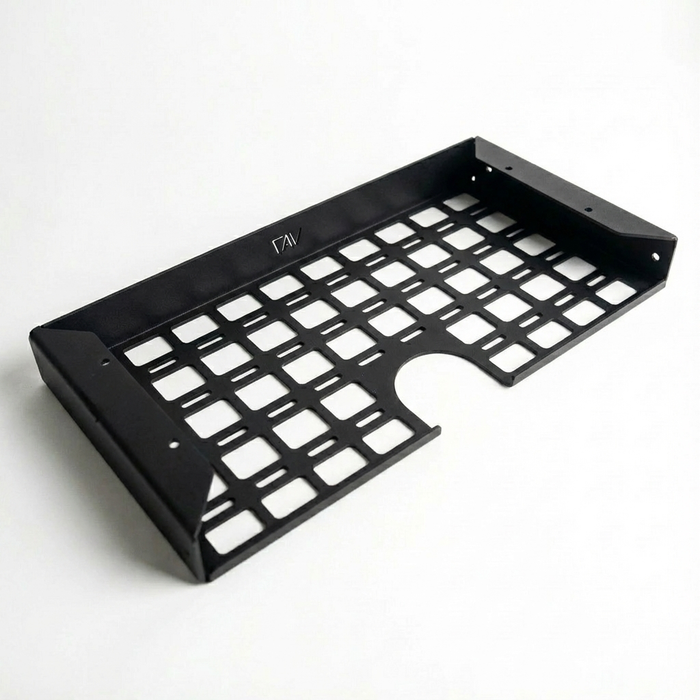 Storyteller undercabinet shelf for driver side with open grid steel design, branded with CAV logo.