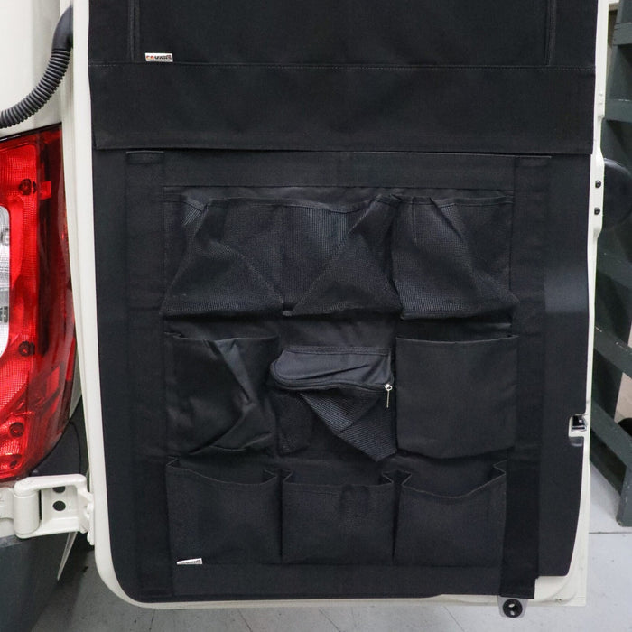 DOORGANIZER by Vanwives mounted on interior van door with multiple black storage pockets