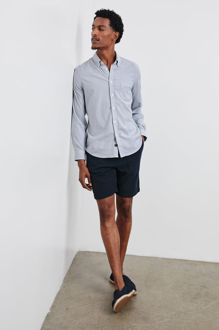 Vance Front Button Shirt in Cotton Blend With Collar, Long Sleeves, and Classic Fit in Blue White Stripe Colorway - Full Body Front View Featured on Model