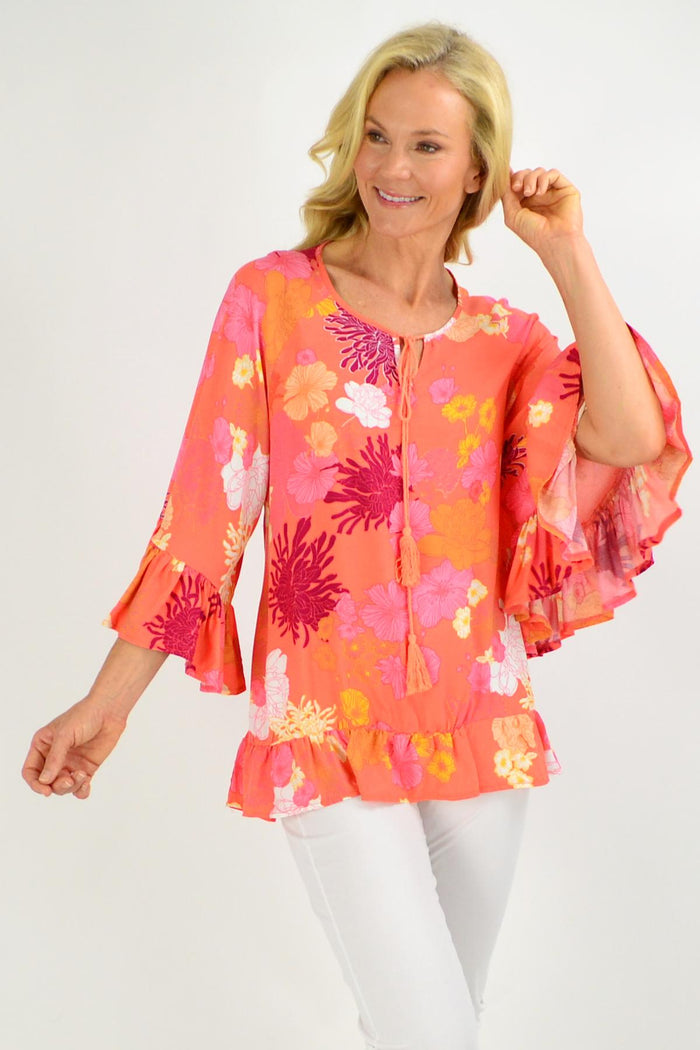 Apricot floral tunic top with wide sleeves from New U Collection, loose fit women's blouse with a casual, elegant style.
