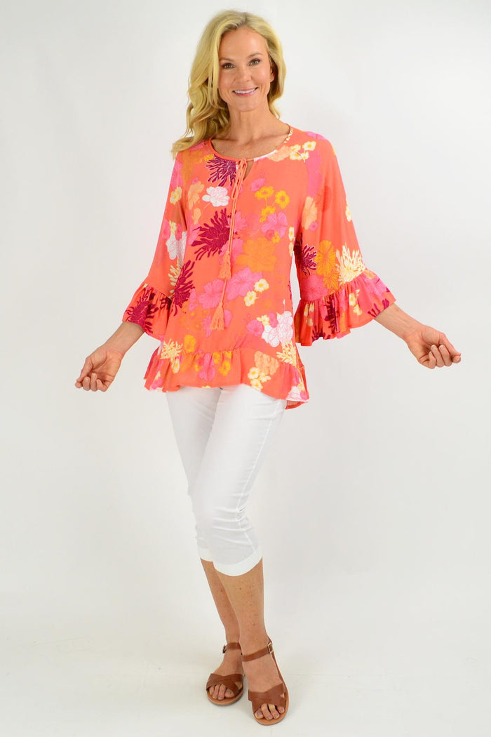 Apricot floral tunic top with wide sleeves from New U Collection, loose fit, perfect for casual or stylish wear.
