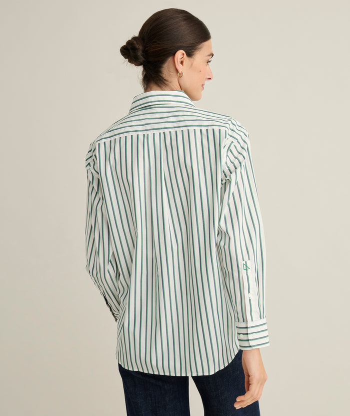 Model is wearing UNTUCKit Melanie in green striped.