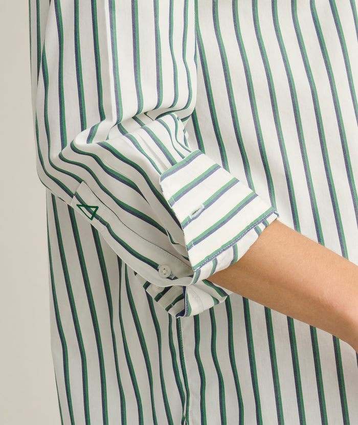 Model is wearing UNTUCKit Melanie in green striped.