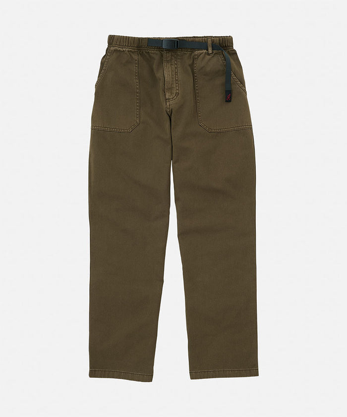Bark pigment colored Gramicci Women's Brooks Pants with a belt against a light-tone background.