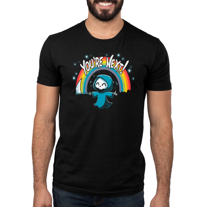 Premium Cotton T-shirt_TeeTurtle You're Next! black t-shirt featuring a cheerful Grim Reaper with a scythe under a rainbow and the text "You're Next!"